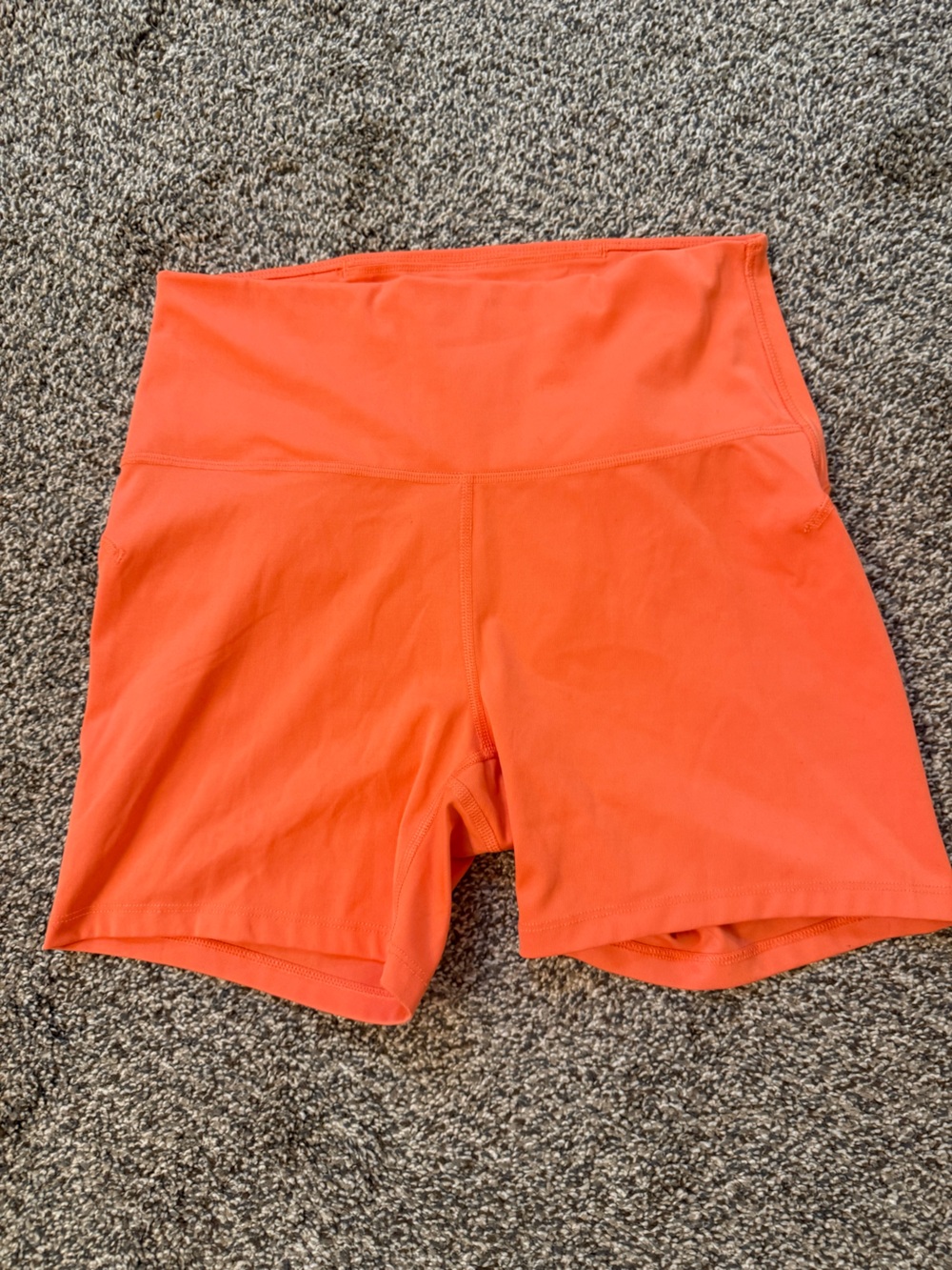 all in motion Women's High-Rise Bike Shorts in Bright Tangerine Orange